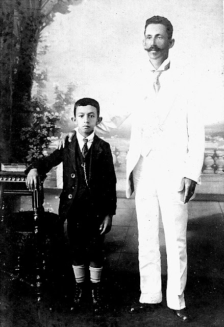 Olympio Brasiliense, criança, com o pai.